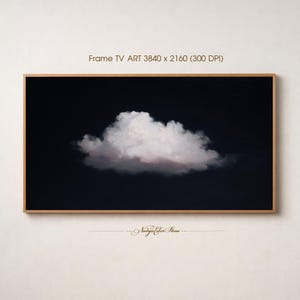 May include: A framed digital art print featuring a single, fluffy white cloud against a dark blue background. The frame is a warm brown color. The text "Frame TV ART 3840 x 2160 (300 DPI)" is at the top.