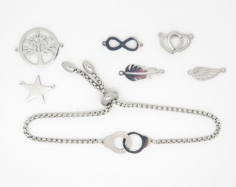 Stainless steel bracelet in handcuffs or tree of life or star or infinity or angel's wing or feather or intertwined hearts