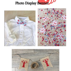 May include: A set of lobster-themed party decorations, including a burlap banner with red lobsters, a white shirt with a blue bow tie featuring red lobsters, and red and blue confetti with lobster designs.