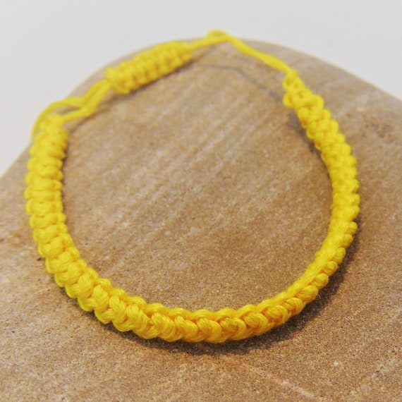 Adventure Cord Crochet Bracelet with Macrame slip knot and bead detail. 
