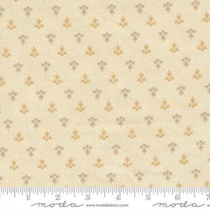 May include: Cream-coloured fabric featuring a repeating pattern of stylised tree shapes in muted gold and grey. The fabric has a textured appearance and a ruler at the bottom, showing inches.