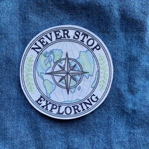 Patch aventure Wanderlust, écusson brodé à repasser, applique de tampon Never Stop Exploring, écusson au dos de la veste