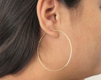 Orecchini a cerchio intrecciati in argento sterling dorato oro