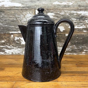 Tarro de galletas con cafetera vaquera moteada en blanco y negro de cerámica vintage