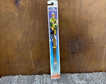 Cepillo de dientes con figura vintage de Peter Pan de Walt Disney, nuevo, sin usar, sellado.