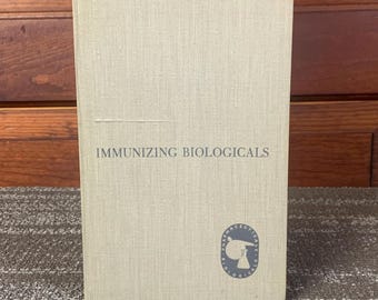 Libro farmacéutico antiguo de Ely Lily: Inmunización con productos biológicos, publicado para la profesión médica.