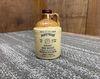 Platte Valley Half Pint Corn Whiskey Crock Thumb Jug - McCormick Distilling Company