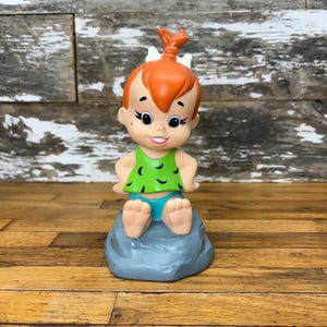 Hucha de goma de Los Picapiedra de Pebbles vintage - Hucha de dibujos animados de Hanna Barbera de 1994