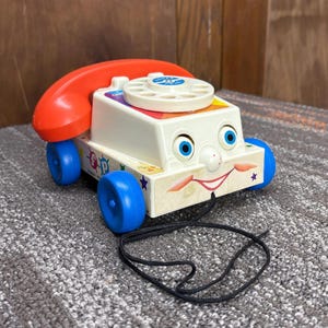 Vintage 2009 Millenial Edition 1960s Style Fisher Price Chatter Phone Pull Toy