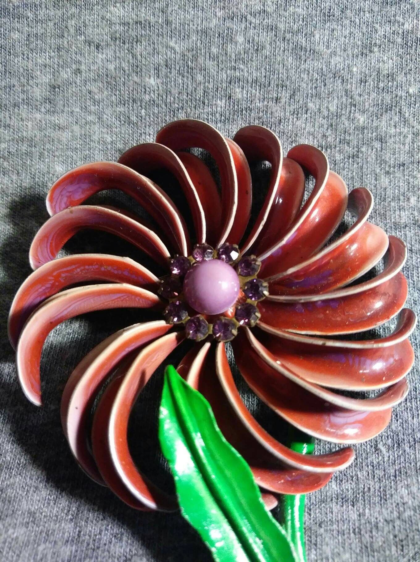 Enamel metal flower brooch with faux amethysts 70s