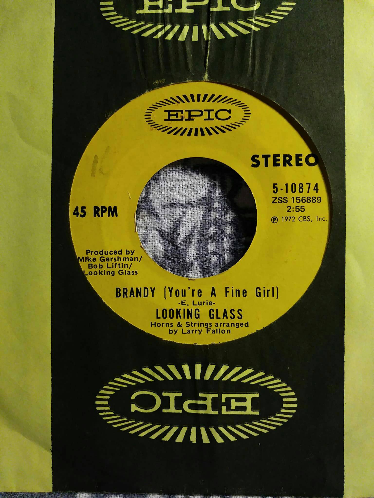 Vintage 45 Brandy by looking glass in original sleeve.