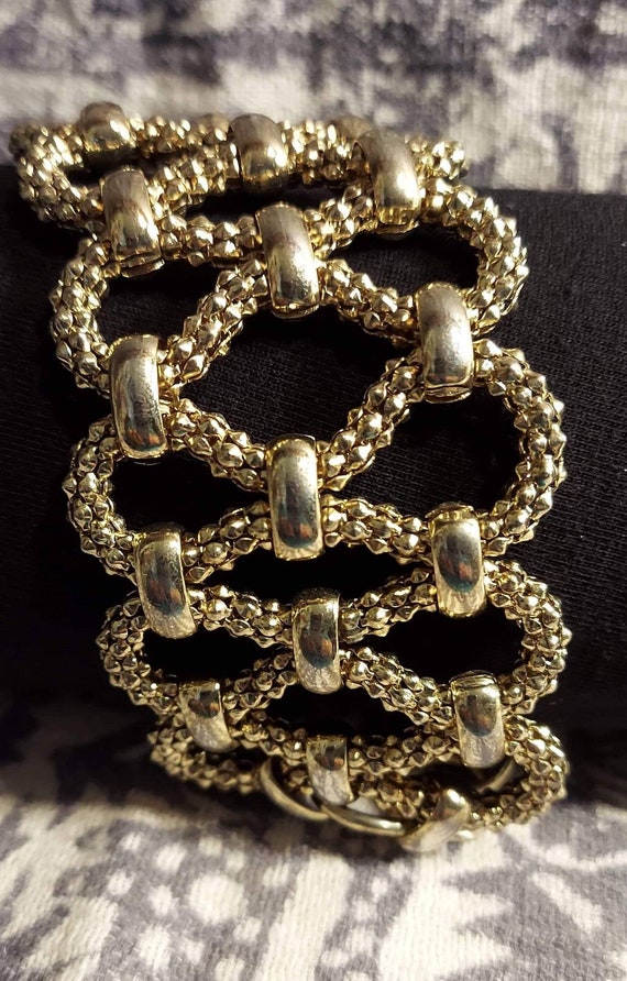 Cuff bracelet statement maker gold tone interwove… - image 1