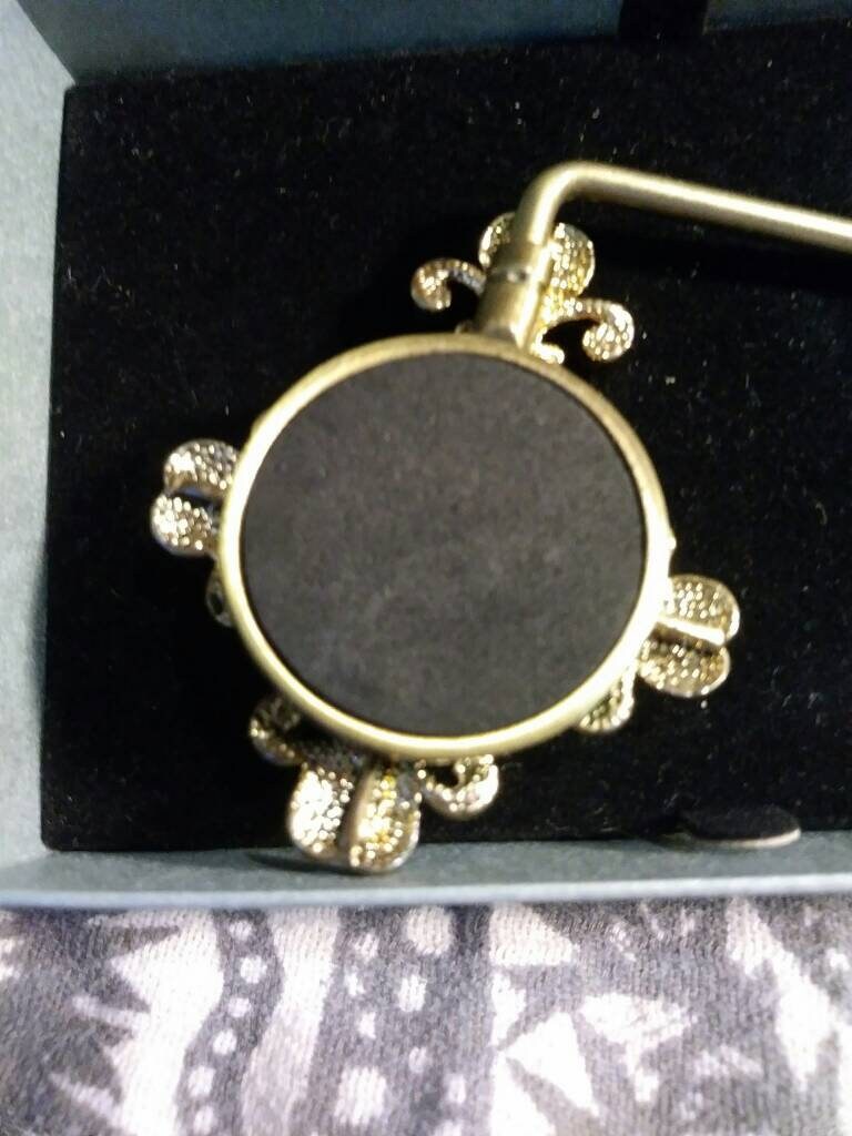 Jeweled handbag holder. 80s