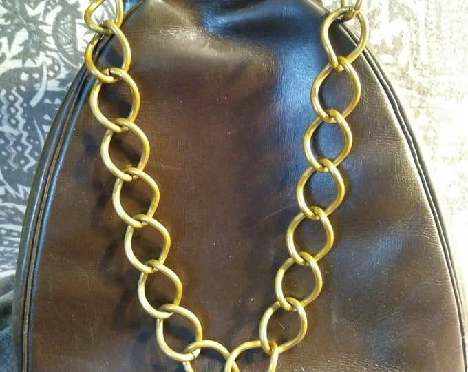 Brown leather handbag chain handle unusual clasp unique vintage 1950s