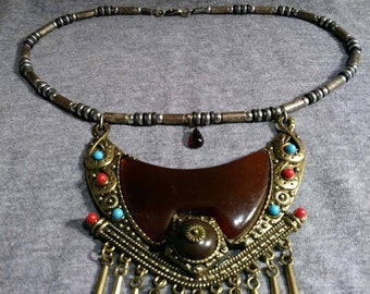 Vintage amulet necklace.  Redesigned, refurbished bits and pieces of vintage jewelry.  By Artist Heather Hutcheson