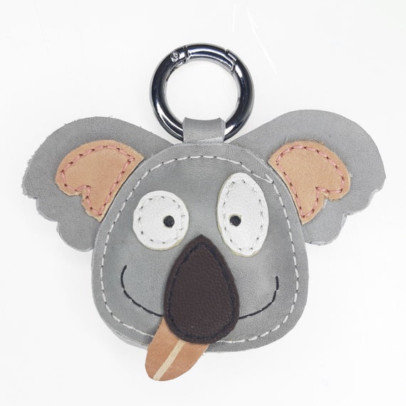 Porte clés animal Koala tout mignon tire la langue en cuir gris