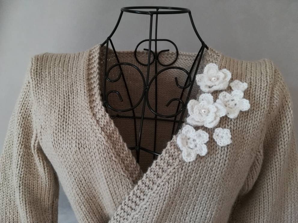 Pull cache coeur laine sale