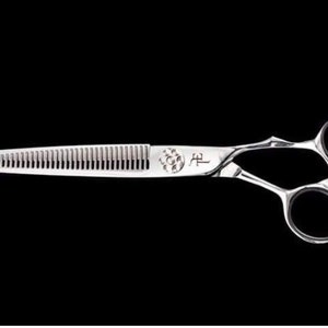 Top edge thinning shears. Great for blending haircuts.