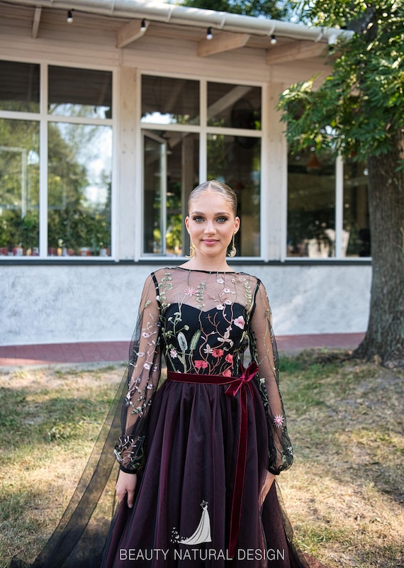 burgundy and black bridesmaid dresses A black wedding moment Bridal + bridesmaid styling ideas for something a little unexpected Swipe for more inspo
