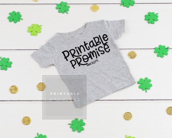 St Patricks Day Grey Infant Baby Shirt Mockups Flatlay St Patricks Day Grey Infant Baby Shirt Mockups Flatlay