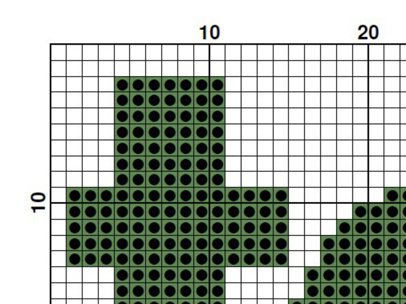 Pode incluir: Desenho verde em forma de cruz criado com c&iacute;rculos pretos e brancos em um fundo de grade branca.