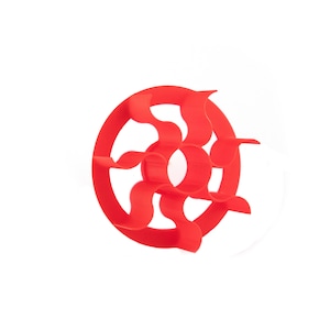 May include: Red plastic sun-shaped wall shelf with a circular design and multiple curved shelves.