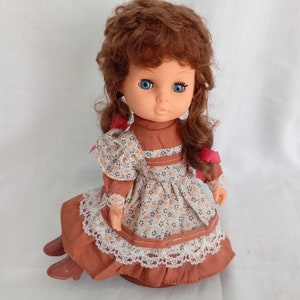 Vintage Kitsch Mid Century Blue Eye Brown Hair Rotating Musical Doll 10&quot;