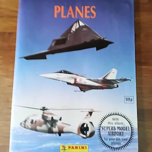 vintage 1990s Panini Planes Sticker Album approx 75% full