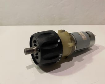 12-volt electric motor with gearbox.