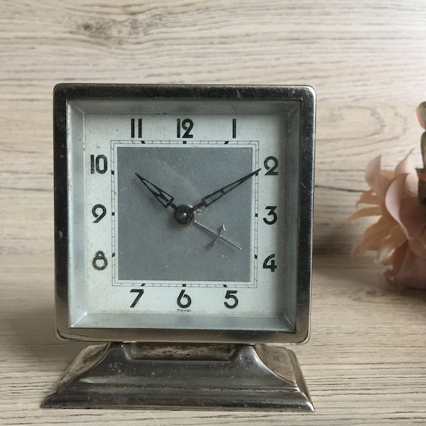 Vintage clock, old clock, broken table clock.