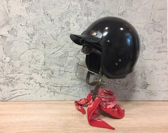 Vintage Black Motorcycle Helmet: 1980s Garage Decor