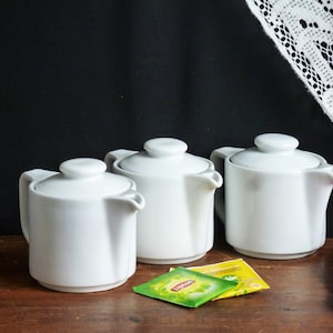 Choice of:Individual porcelain teapot or set, White tea server, tea kettle, French table gift, white coffee maker, white porcelain tableware