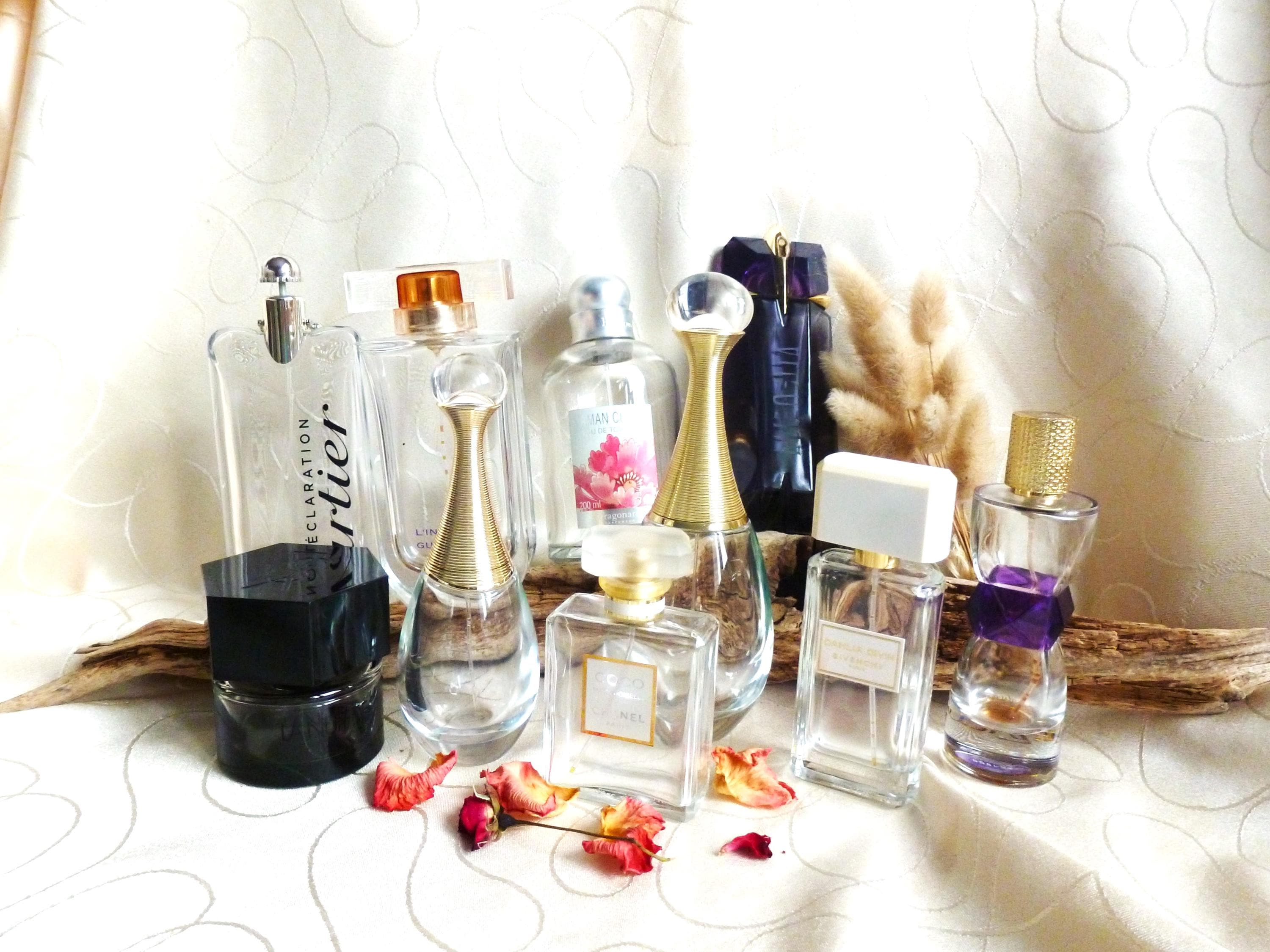 Collection of empty bottles of French luxury perfumes, bathroom decoration, Parfums Dior, Yves Saint-Laurent, Guerlain, Givenchy Coco Chanel