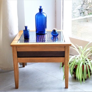 Indonesian coffee table in bamboo wood and glass shelf, bamboo stool plant holder, bamboo side cabinet, bamboo side table.