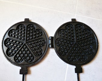 Old black painted cast iron waffle iron, old waffle mold, vintage cake mold, cast iron fireplace decor, French country house decor.