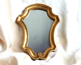 Louis XV style mirror, Golden mirror 1950s, gilded mirror decoration with gold leaf, golden mirror wall decoration, gold oval mirror.