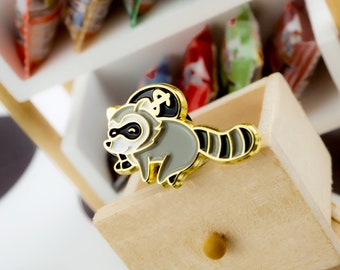 Rogue Raccoon Enamel Pin - Stealing hearts, one pin at a time | Bandit on the run