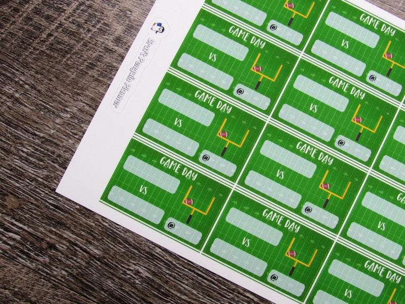 May include: Printable game day scorecards with a green football field background and a football goal post with a football. The text "GAME DAY" is printed on each card with spaces to write in the teams playing and the score.