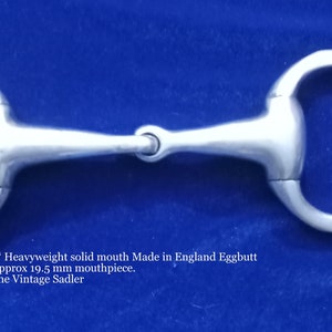 May include: A 5 inch silver eggbutt bit with a solid mouth. The bit is made in England and has a 19.5 mm mouthpiece.