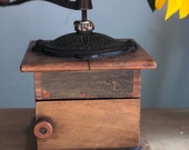 Antique late 1800 39 s waddells improved wood coffee mill grinder with cast iron handle and decorative door.