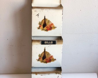 Vintage metal hanging three slot mail sorter with fruit decals.