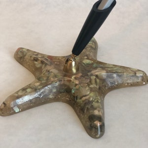 vintage acrylic/lucite starfish with abalone shells embedded pencil or pen holder.