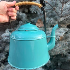 May include: A set of three ceramic mugs with a speckled, matte finish. The mugs are in shades of cream, light gray, and dark gray. Each mug has a simple, minimalist design, perfect for coffee or tea.
