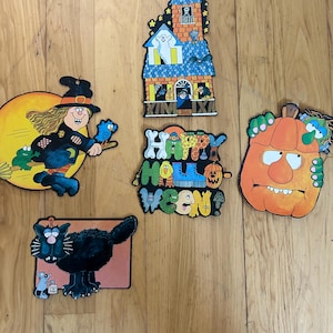 Vintage set of five carboard classroom Halloween die cuts. Halloween die cuts. Witch, happy Halloween, pumpkin, black cat and haunted house.