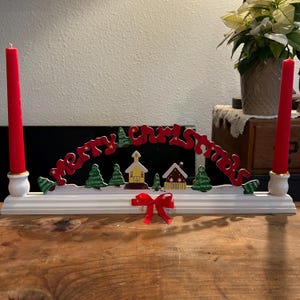 Vintage 1970’s-80s merry Christmas taper candle holder. Christmas around the world brand. snow scene with houses and trees. Candelabra.