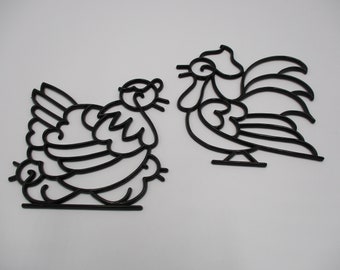 Pair of Black Plastic Hot Pads, Rooster and Hen with chicks.