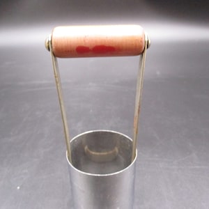 Large Grapefruit Corer,  Faded Red Bakelite Handle