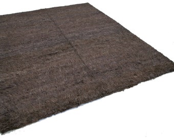 Brown kilim rug