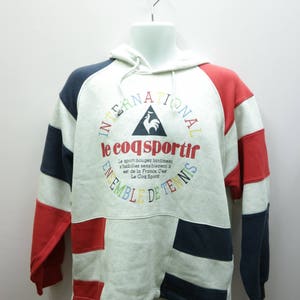 le coq sportif international shipping