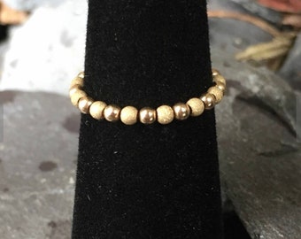 Gold  14 kt stretch bead Toe ring  with peach gold sparkle beads comfy!  U.K.